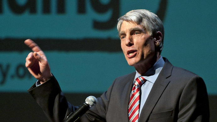U.S. Senator Udall speaks during a memorial service marking the anniversary of the Tuscon shooting, at the University of Arizona campus