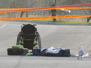 Local Input~ MONTREAL, QUE.: MAY 7, 2015 -- A wheelchair sits on rue Yves-Blais in Terrebonne north of of Montreal, Thursday May 7, 2015, after the man in it was fatally shot Wednesday night.  (Phil Carpenter / MONTREAL GAZETTE) ORG XMIT: POS1505071248364810