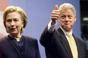 US President Bill Clinton (R) gives a thumbs up sign with First Lady Hillary Rodham Clinton (L) as they took to the stage prior to addressing the people of Buffalo, New York at the Marine Midland Arena 20 January. This is the first official trip of Clinton to Buffalo and comes after his State of the Union speech to Congress.        (ELECTRONIC IMAGE)            AFP PHOTO/Stephen JAFFE ORG XMIT: BUF99