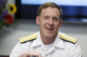 National Security Agency (NSA) Director Admiral Michael Rogers smiles at a Reuters CyberSecurity Summit in Washington May 12, 2014.  REUTERS/Larry Downing