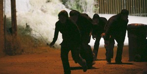 31 May 2010- Nogales, AZ- Four Mexican people sneak away from the US/Mexico border fence behind them after illegally crossing into the border town of Nogales, Arizona. They tried to stay low until they could blend into the town streets, but were caught and arrested shortly afterwards by US Customs and Border Protection agents. Nogales has seen a rise on illegal immigrant crossings and it is possible that a tightened California border may be pushing migrants to cross in Arizona. The Nogales rough, hilly terrain presents more challenges to secure the border then other areas along the 2,000 mile border fence. The national spotlight hit Arizona recently after the controversial immigration bill SB 1070 was announced. SB 1070 makes it a state crime to be in the United States illegally. Photo Credit: Krista Kennell/Sipa Press. /nogalesbordercrossing.005/1005312030 (Sipa via AP Images)