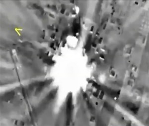 In this photo made from footage taken from Russian Defense Ministry official website on Thursday, Oct. 1, 2015, a bomb explosion is seen in Syria. Reacting to criticism that it is targeting opponents of the Syrian government, a spokesman for Russian President Vladimir Putin admitted on Thursday that Russia's airstrikes in Syria are targeting not only Islamic State militants but also other groups. (AP Photo/Russian Defense Ministry Press Service)