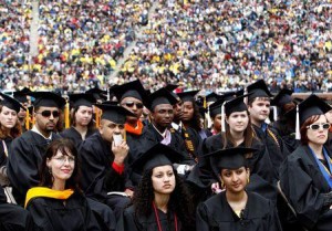 Graduating students listen to U.S. President Barack Obama speak at the University of Michigan commencement ceremony in Ann Arbor, Michigan May 1, 2010. REUTERS/Kevin Lamarque